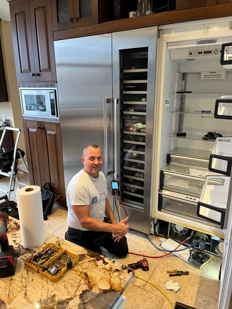 Viktor Working On A Theremador Fridge